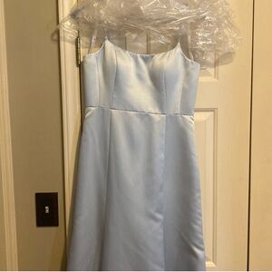 Beautiful ice blue bridesmaid dress. Wore once. Dry cleaned. Built in bra